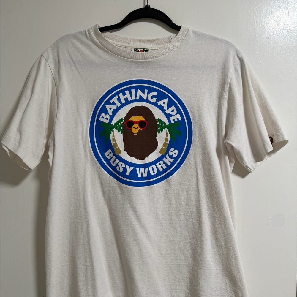 Bape White Graphic Tee with Blue and Brown Accents
